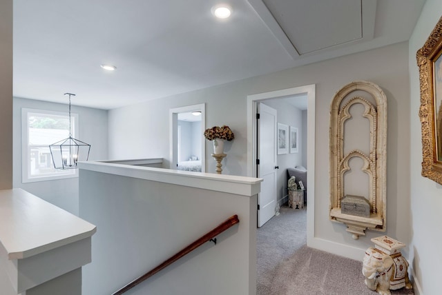 588 Davis Valley Dr, Columbia, TN 38401 - hall with an upstairs landing, light colored carpet, recessed lighting, attic access, and a chandelier