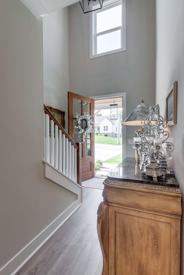 588 Davis Valley Dr, Columbia, TN 38401 - foyer entrance featuring a chandelier, light wood-style flooring, stairs, and a towering ceiling