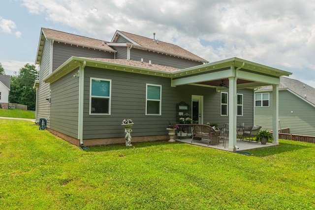 588 Davis Valley Dr, Columbia, TN 38401 - back of property featuring a patio, ceiling fan, a yard, and an outdoor hangout area