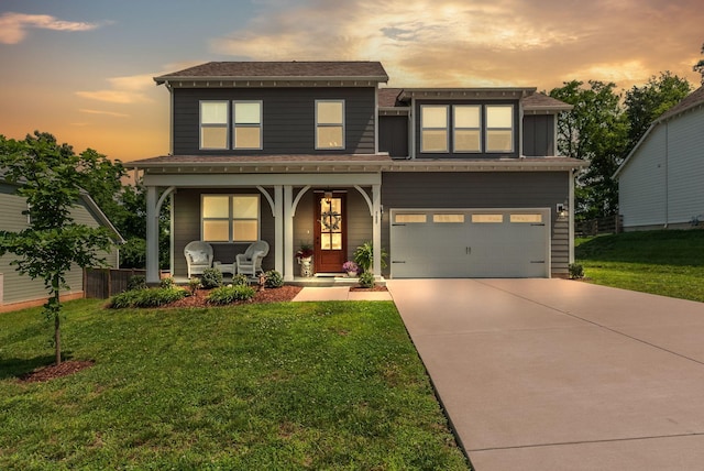 588 Davis Valley Dr, Columbia, TN 38401 - view of front of home with a porch, concrete driveway, an attached garage, and board and batten siding