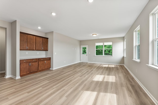 15 Aurora Cir, Fayetteville, TN 37334 - unfurnished living room with light wood-style flooring and recessed lighting
