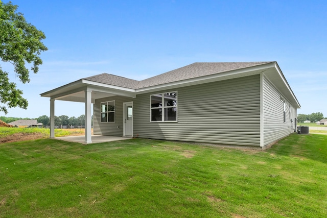 15 Aurora Cir, Fayetteville, TN 37334 - back of house featuring a patio area, a yard, and a shingled roof