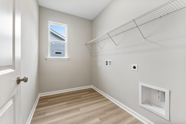 15 Aurora Cir, Fayetteville, TN 37334 - laundry area featuring hookup for a washing machine, electric dryer hookup, and light wood finished floors