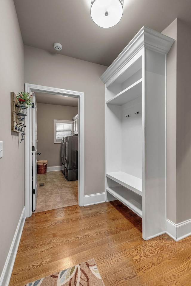 122 Ridgebend Dr, Murfreesboro, TN 37128 - mudroom with washing machine and clothes dryer and light wood-type flooring