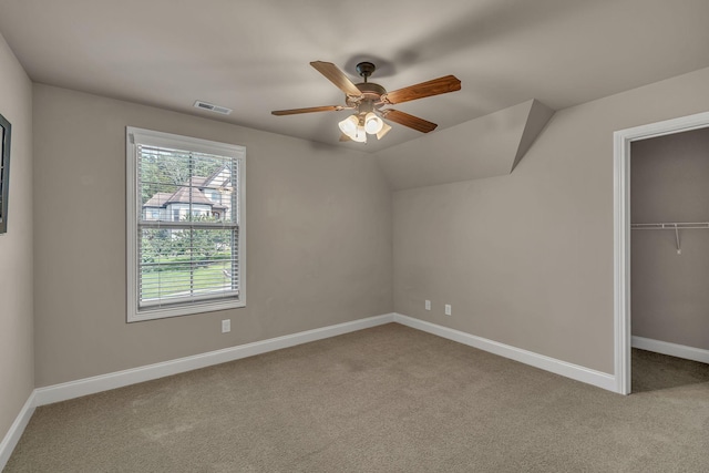 122 Ridgebend Dr, Murfreesboro, TN 37128 - unfurnished bedroom featuring carpet flooring, a ceiling fan, a walk in closet, and a closet