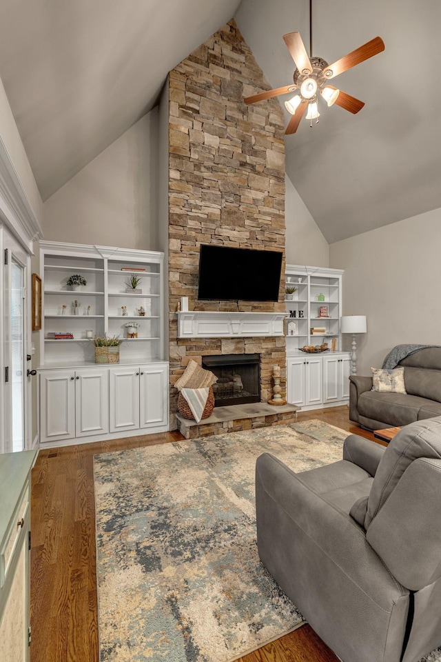 122 Ridgebend Dr, Murfreesboro, TN 37128 - living area featuring vaulted ceiling, wood finished floors, ceiling fan, and a fireplace