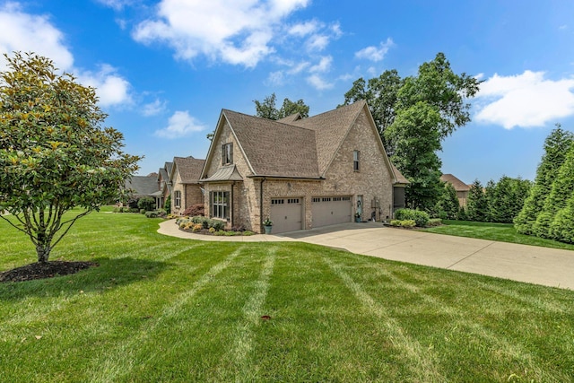 122 Ridgebend Dr, Murfreesboro, TN 37128 - view of front of property featuring driveway, a front lawn, brick siding, an attached garage, and roof with shingles