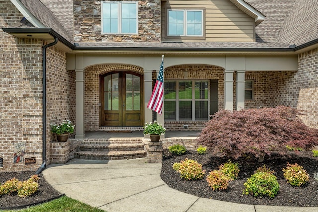 122 Ridgebend Dr, Murfreesboro, TN 37128 - property entrance with brick siding, french doors, a porch, and a shingled roof
