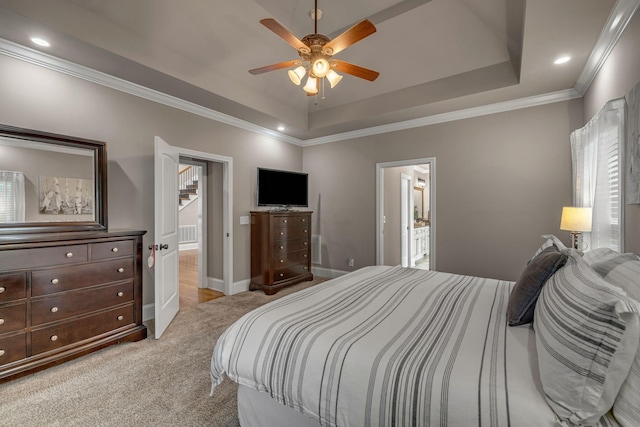 122 Ridgebend Dr, Murfreesboro, TN 37128 - bedroom with a tray ceiling, ornamental molding, connected bathroom, light colored carpet, and recessed lighting