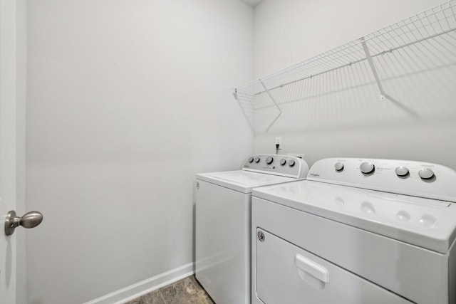 8044 Typhani Way, White House, TN 37188 - washroom featuring washing machine and clothes dryer and baseboards