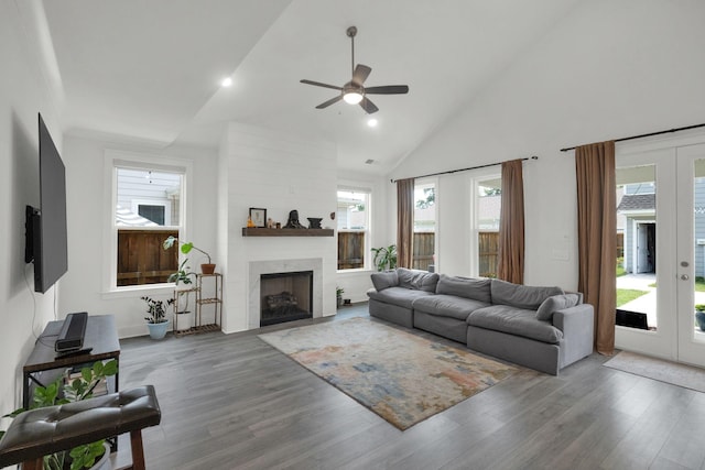 373 Hammock Ln, Spring Hill, TN 37174 - living room with french doors, a ceiling fan, a fireplace, wood finished floors, and high vaulted ceiling