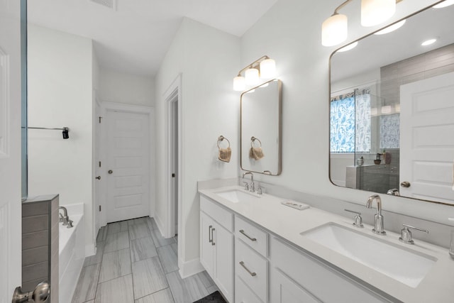 373 Hammock Ln, Spring Hill, TN 37174 - full bathroom featuring double vanity, a tile shower, and a bath