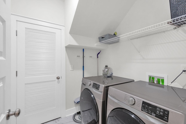 373 Hammock Ln, Spring Hill, TN 37174 - laundry area with washing machine and dryer and marble finish flooring