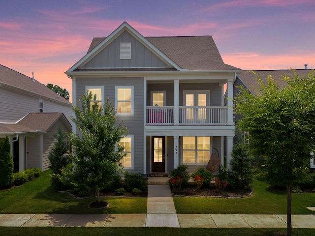 373 Hammock Ln, Spring Hill, TN 37174 - view of front of property featuring a balcony, a porch, board and batten siding, and a lawn