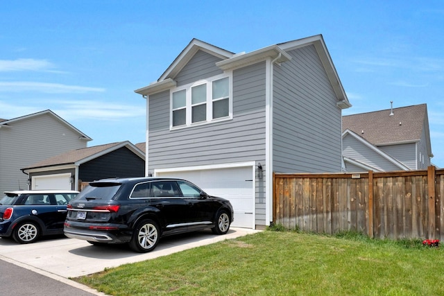 373 Hammock Ln, Spring Hill, TN 37174 - view of property exterior with concrete driveway and an attached garage