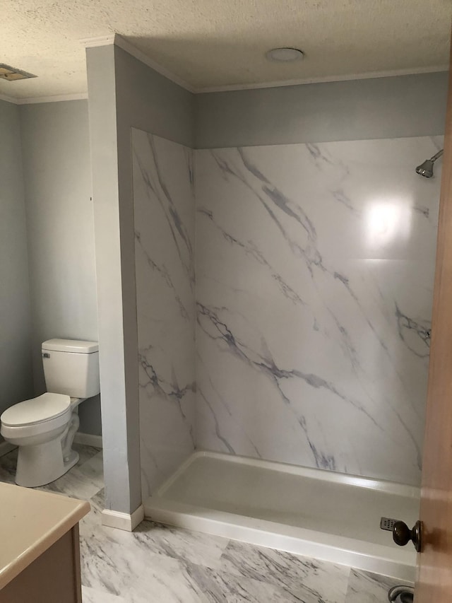 233 W Chestnut St, Puryear, TN 38251 - full bathroom featuring ornamental molding, vanity, a marble finish shower, a textured ceiling, and marble finish flooring
