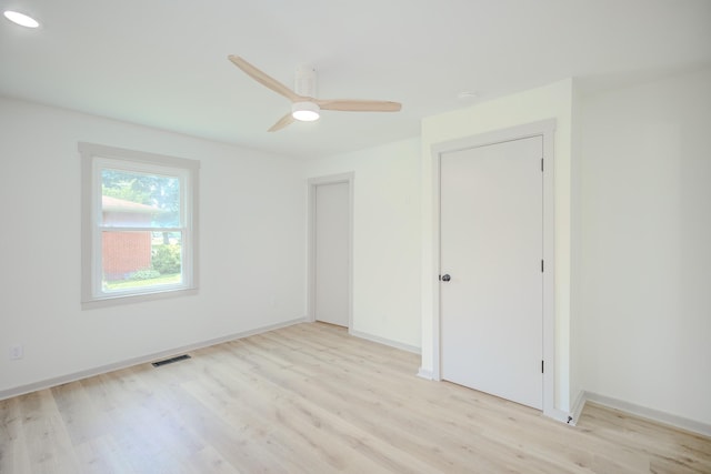 445 High Point Rd, Clarksville, TN 37042 - unfurnished bedroom with light wood-style flooring and ceiling fan