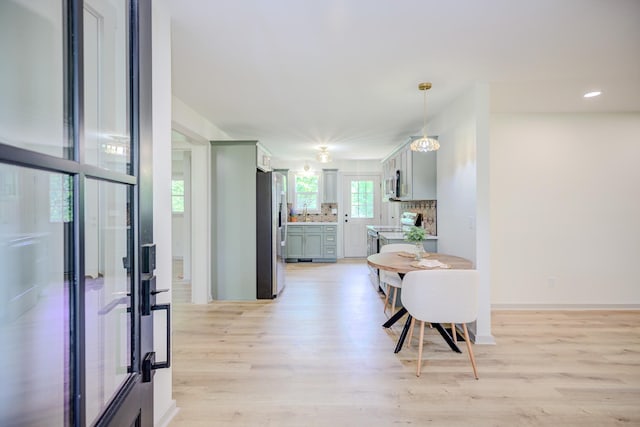 445 High Point Rd, Clarksville, TN 37042 - dining room with light wood-type flooring and baseboards