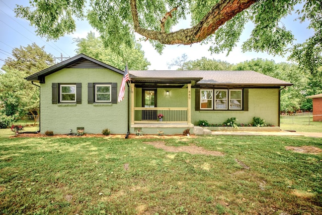445 High Point Rd, Clarksville, TN 37042 - ranch-style home with brick siding, a front yard, covered porch, and a shingled roof