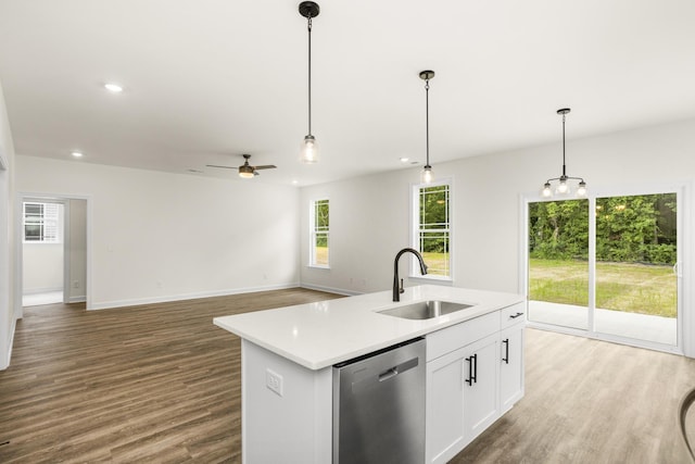 4026 Rampart Way, Spring Hill, TN 37174 - kitchen with dishwasher, wood finished floors, hanging light fixtures, and recessed lighting