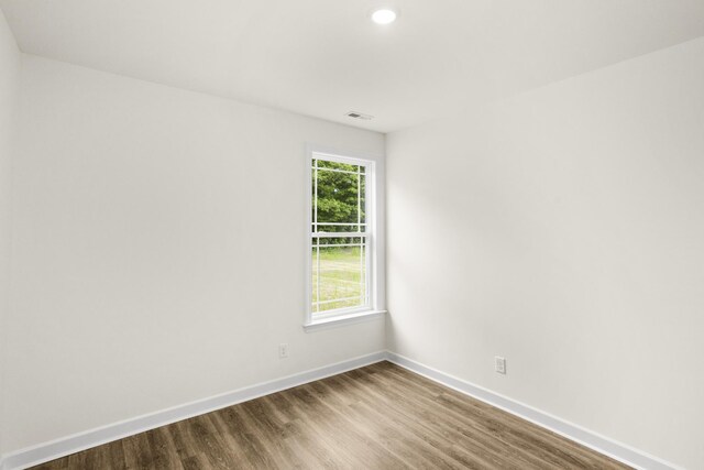 4026 Rampart Way, Spring Hill, TN 37174 - spare room with wood finished floors and recessed lighting