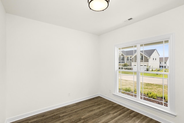 4026 Rampart Way, Spring Hill, TN 37174 - spare room featuring baseboards and dark wood finished floors