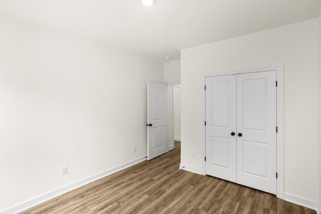 4026 Rampart Way, Spring Hill, TN 37174 - unfurnished bedroom featuring wood finished floors, a closet, and recessed lighting