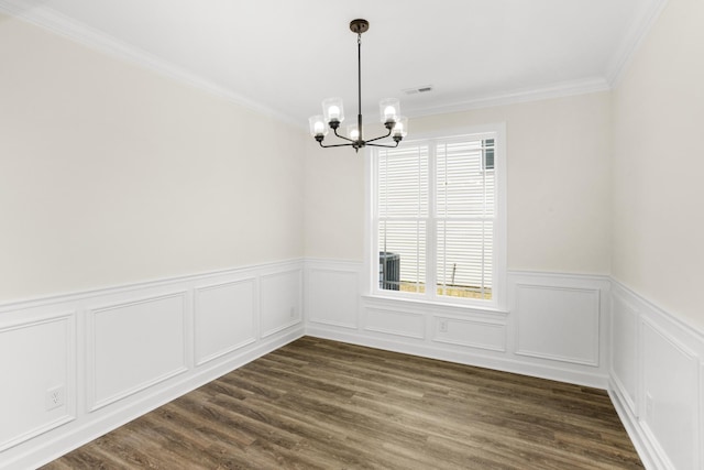 4026 Rampart Way, Spring Hill, TN 37174 - unfurnished dining area with a chandelier, a wainscoted wall, crown molding, and dark wood finished floors