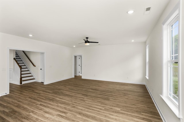 4026 Rampart Way, Spring Hill, TN 37174 - empty room with a ceiling fan, healthy amount of natural light, wood finished floors, recessed lighting, and stairs