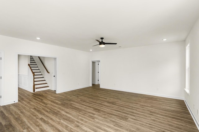 4026 Rampart Way, Spring Hill, TN 37174 - empty room featuring wood finished floors, a ceiling fan, stairs, and recessed lighting