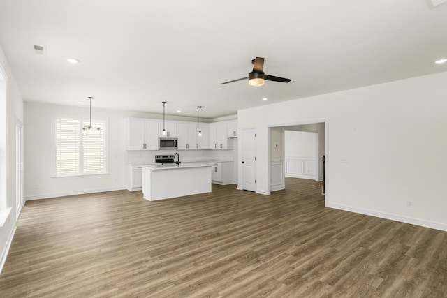 4026 Rampart Way, Spring Hill, TN 37174 - unfurnished living room with wood finished floors, recessed lighting, and a ceiling fan