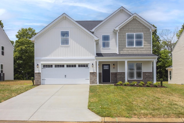 4026 Rampart Way, Spring Hill, TN 37174 - craftsman-style house with a front yard, a garage, driveway, and stone siding