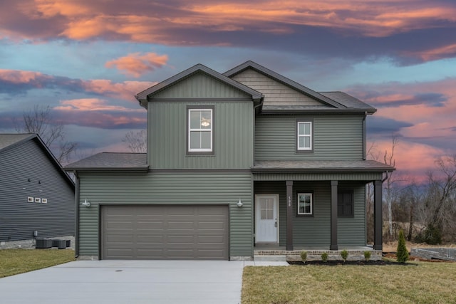 30 Cherry Acres, Clarksville, TN 37042 - view of front facade featuring covered porch, driveway, and a lawn