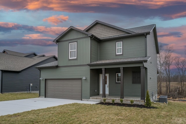 30 Cherry Acres, Clarksville, TN 37042 - view of front facade featuring a porch, concrete driveway, a lawn, and board and batten siding