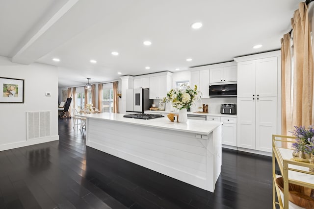 2117 Strombury Dr, Hermitage, TN 37076 - kitchen featuring appliances with stainless steel finishes, white cabinetry, light countertops, and recessed lighting