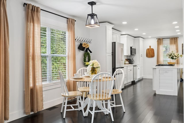 2117 Strombury Dr, Hermitage, TN 37076 - dining room with healthy amount of natural light, recessed lighting, and dark wood finished floors