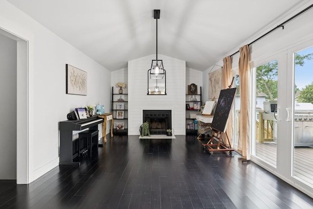 2117 Strombury Dr, Hermitage, TN 37076 - sitting room with lofted ceiling, wood finished floors, and a large fireplace