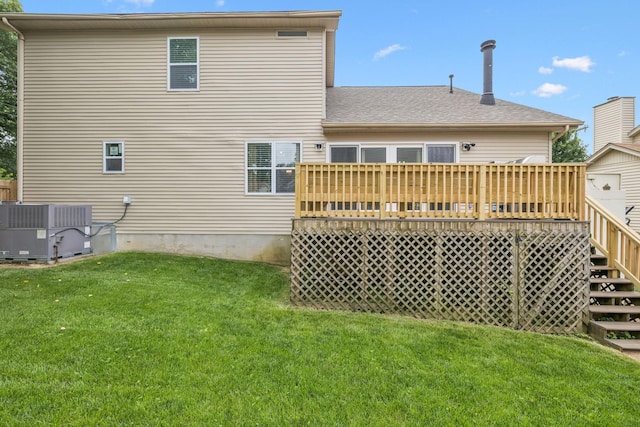 2117 Strombury Dr, Hermitage, TN 37076 - back of house featuring a deck, a lawn, stairs, and a shingled roof