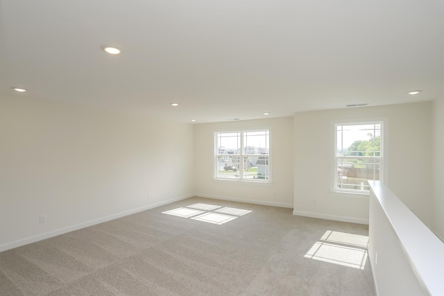 4020 Rampart Way, Spring Hill, TN 37174 - empty room featuring light colored carpet, healthy amount of natural light, and recessed lighting
