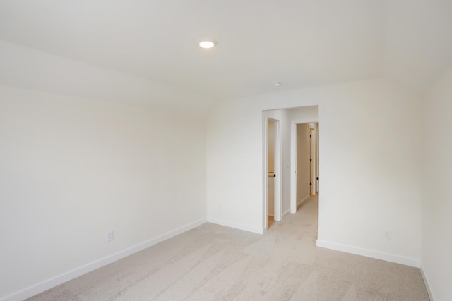 4020 Rampart Way, Spring Hill, TN 37174 - empty room featuring vaulted ceiling, light colored carpet, and recessed lighting