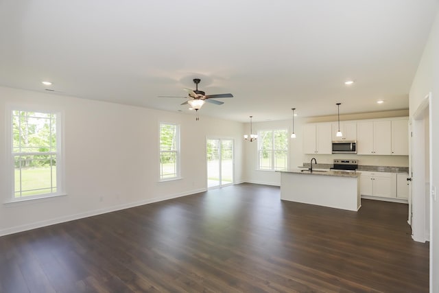 4020 Rampart Way, Spring Hill, TN 37174 - unfurnished living room with dark wood-style flooring, ceiling fan, and recessed lighting