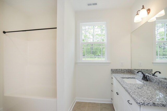 4020 Rampart Way, Spring Hill, TN 37174 - full bathroom featuring vanity, shower / bathtub combination, and tile patterned flooring