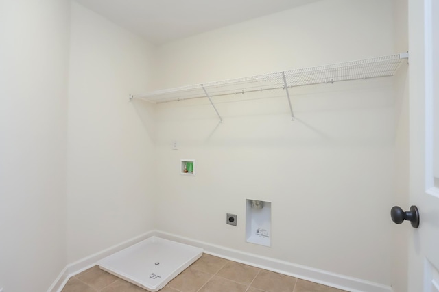 4020 Rampart Way, Spring Hill, TN 37174 - laundry area with hookup for a washing machine, hookup for an electric dryer, and light tile patterned flooring