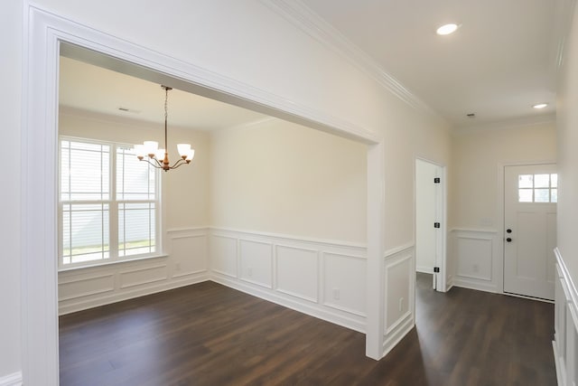 4020 Rampart Way, Spring Hill, TN 37174 - unfurnished room with ornamental molding, dark wood finished floors, a chandelier, a wainscoted wall, and a decorative wall