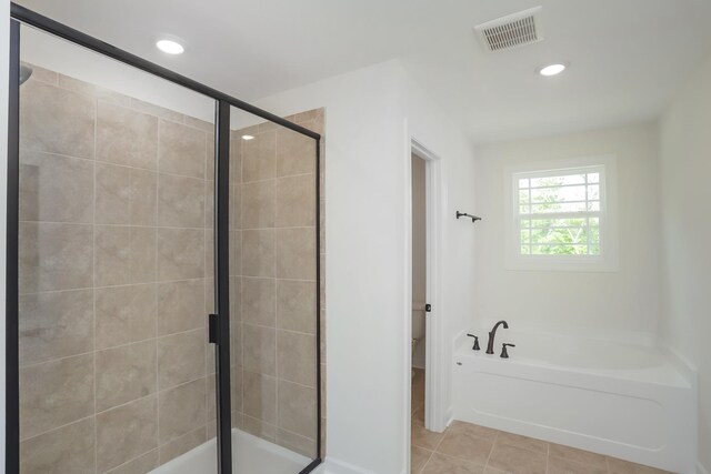 4020 Rampart Way, Spring Hill, TN 37174 - full bathroom featuring a garden tub, a stall shower, recessed lighting, and tile patterned floors