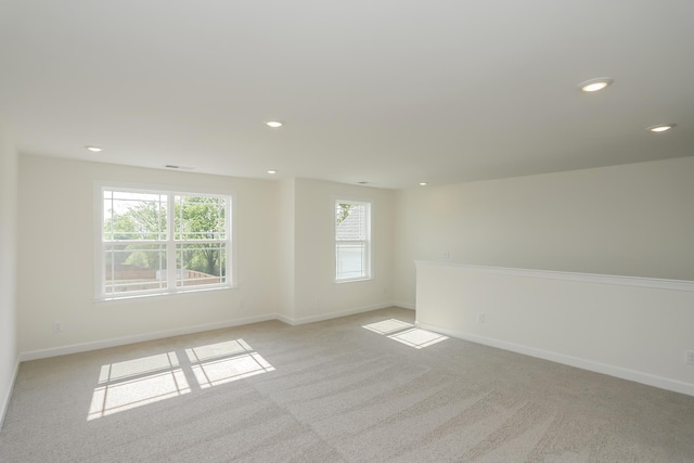 4020 Rampart Way, Spring Hill, TN 37174 - empty room featuring light carpet, plenty of natural light, and recessed lighting