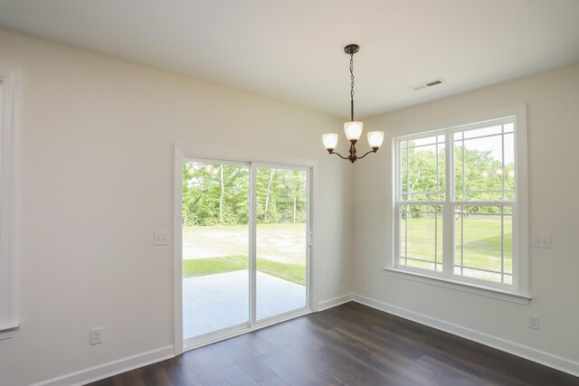 4020 Rampart Way, Spring Hill, TN 37174 - spare room with a chandelier, healthy amount of natural light, and dark wood-style floors