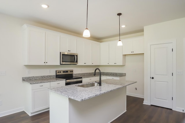 4020 Rampart Way, Spring Hill, TN 37174 - kitchen featuring appliances with stainless steel finishes, dark wood-type flooring, white cabinetry, and recessed lighting