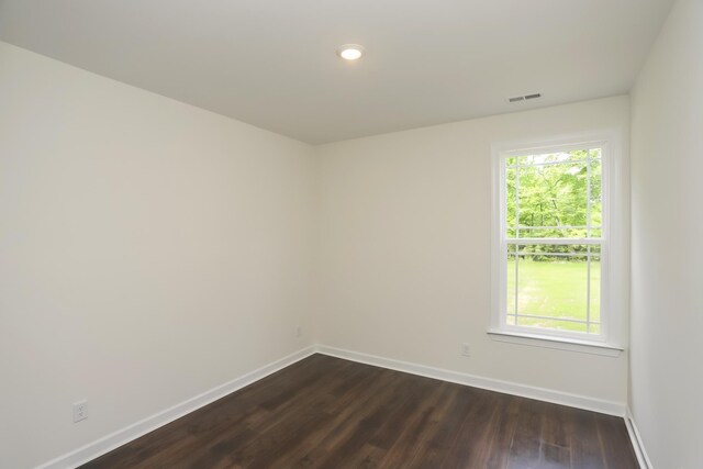 4020 Rampart Way, Spring Hill, TN 37174 - spare room featuring dark wood-style flooring, plenty of natural light, and recessed lighting