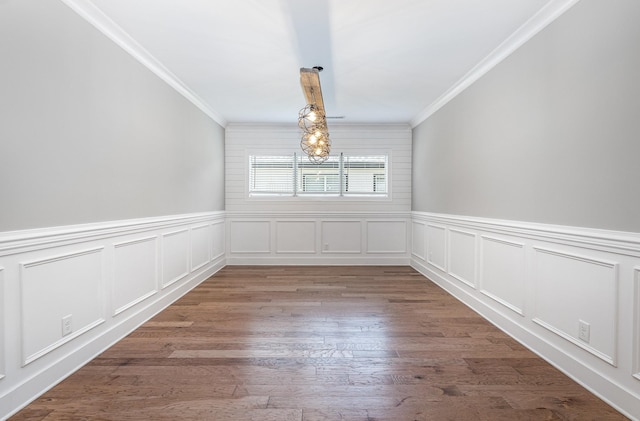 2050 Beamon Dr, Franklin, TN 37064 - unfurnished dining area featuring crown molding, a decorative wall, light wood-style floors, wainscoting, and a chandelier